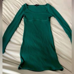 Short green bodycon dress